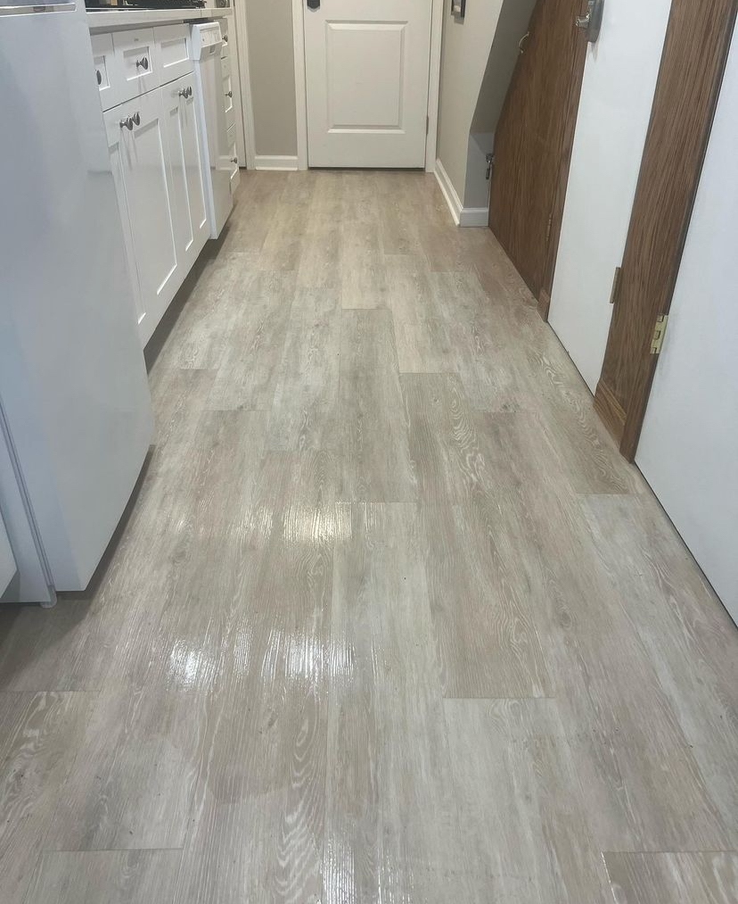 Clean wooden floor in a bright kitchen