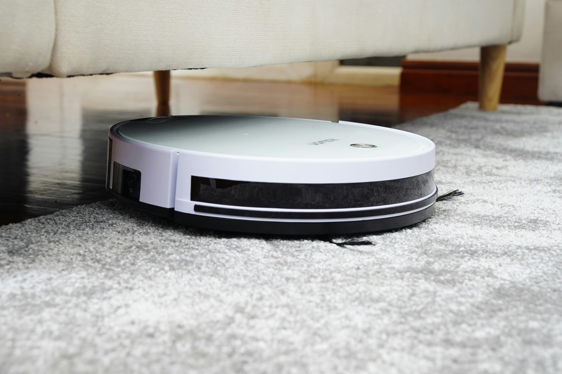 Robot vacuum cleaning under a furniture edge